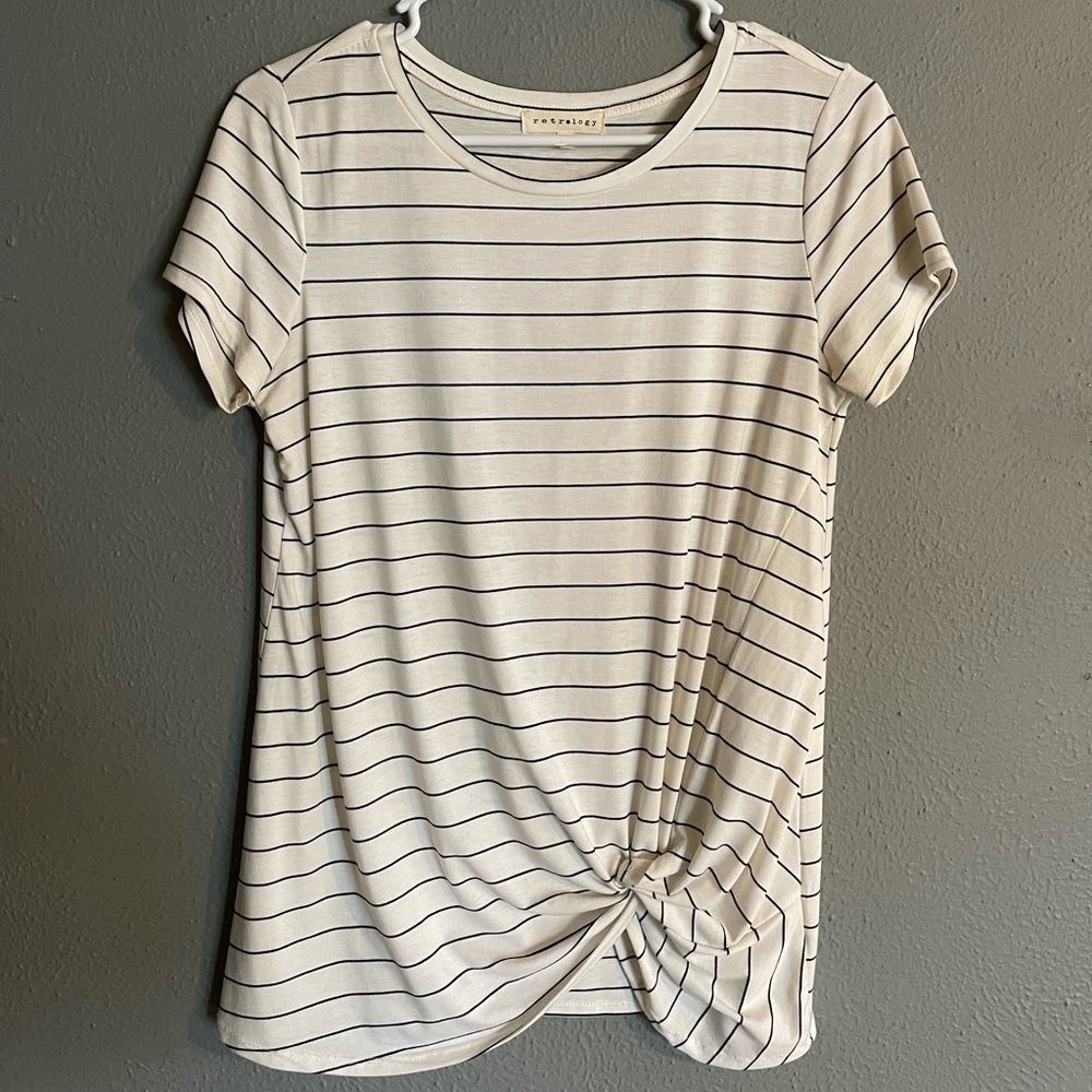 White top with black stripes
